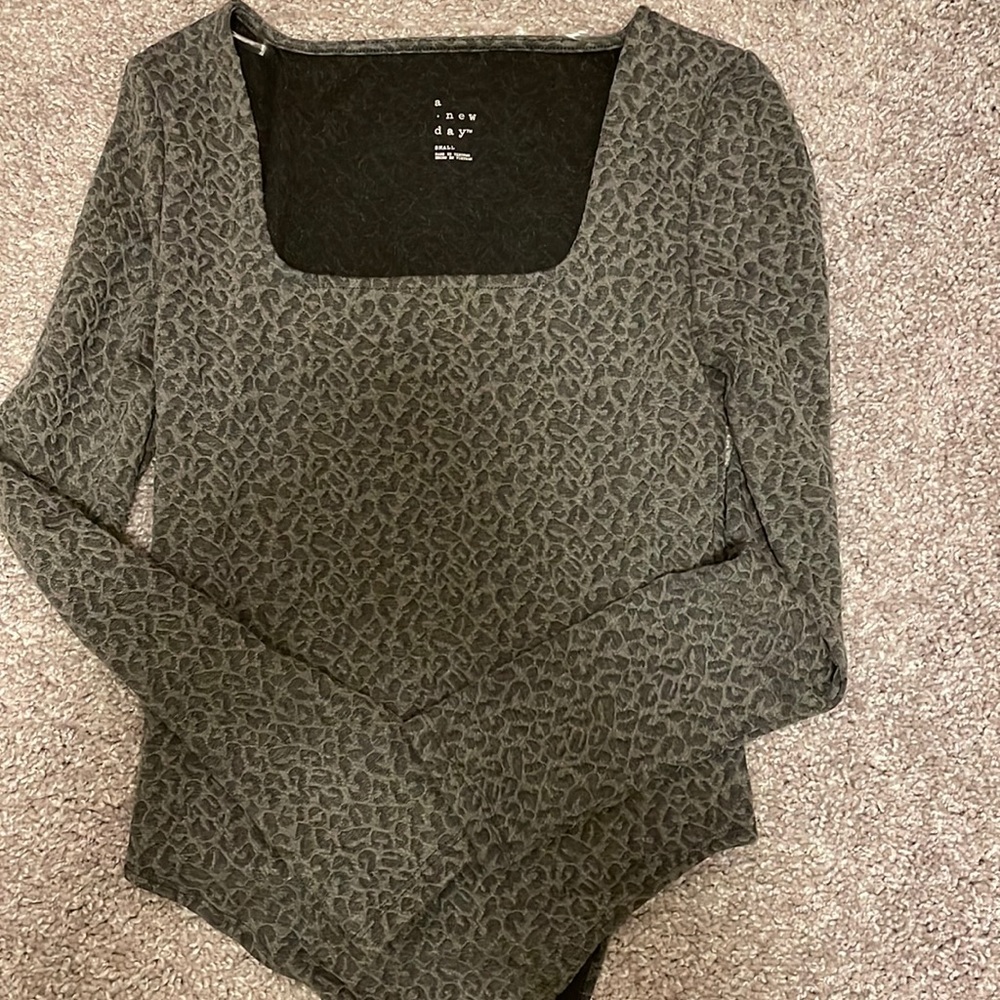 Grey body suit